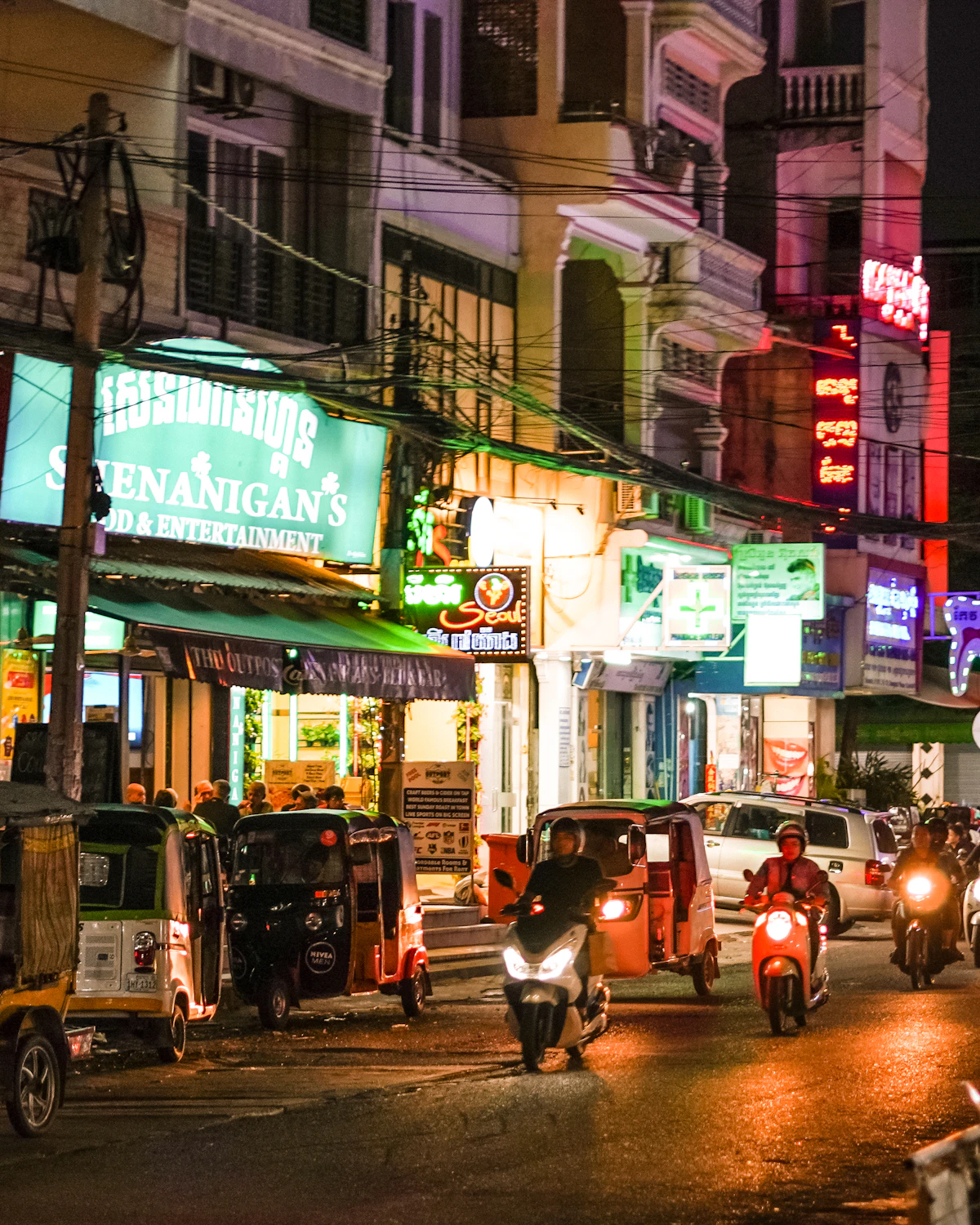 People enjoying an evening market in Phnom Penh